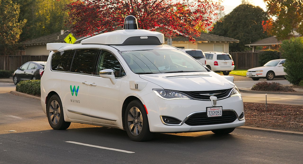 Waymo autonomous vehicle with roof sensor pod